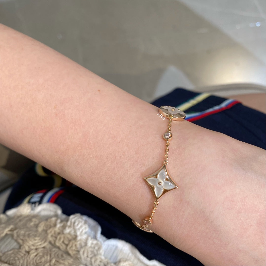 ¡®lume Jewelry¡¯STAR AND SUN 4 MOTIF WHITE MOP PINK GOLD BRACELET